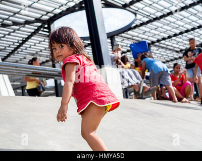 Little Girl in Red Dress Stock Photo