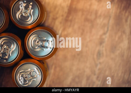 Beer cans on rustic wooden table top view with copy space Stock Photo
