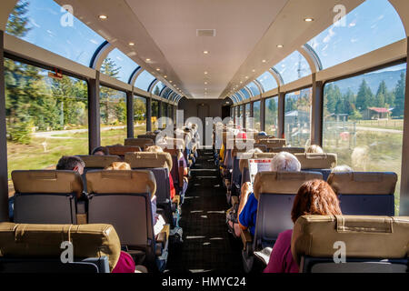 Inside the carriage of the Rocky Mountaineer railway train as it rolls through the countryside of British Columbia, Canada.