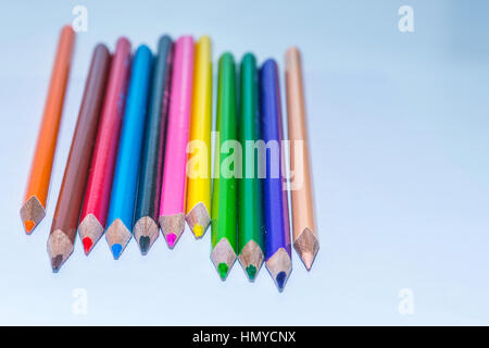 Colored crayons on the white background, school Stock Photo