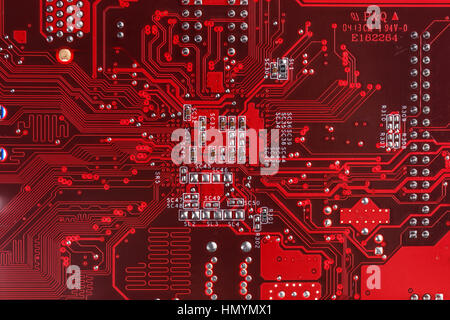 Red circuit board background of computer motherboard Stock Photo