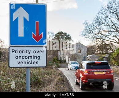 Priority over oncoming vehicles road sign, Brough, Derbyshire. England, UK Stock Photo