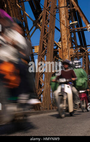 Vietnam. Hanoi. Bikes in Long Bien Bridge Stock Photo