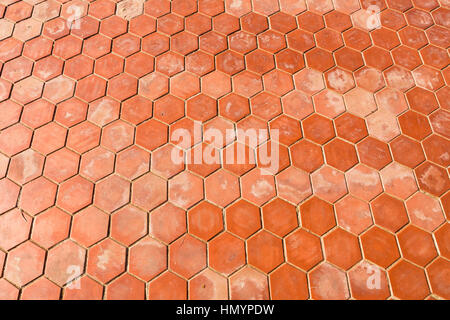 Closeup of Cement floor in hexagonal clay tiles Stock Photo