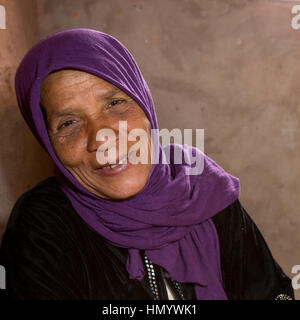 Morocco.  Amazigh Berber Woman in her Home, Ait Benhaddou Ksar, a World Heritage Site. Stock Photo