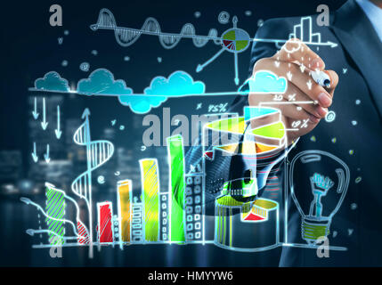 Close up of businessman sketching graphs and diagrams on screen Stock Photo