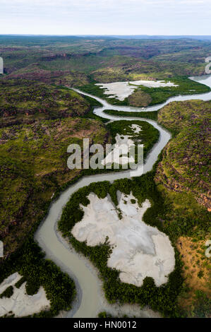 An aerial view of river tidal inlets winding their way through mangrove forests. Stock Photo