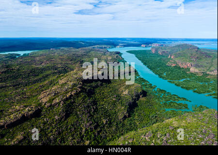 An aerial view of river tidal inlets winding their way through mangrove forests. Stock Photo