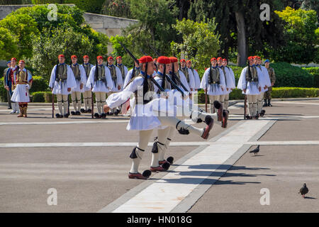 Changing of the guards in front of Parliament, Evzones at the Tomb of the Unknown Soldier on Syntagma Square in Athens, Greece Stock Photo