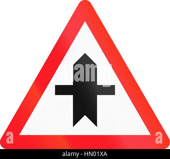 Road sign used in Switzerland - Crossroad with a non-priority road. Stock Photo