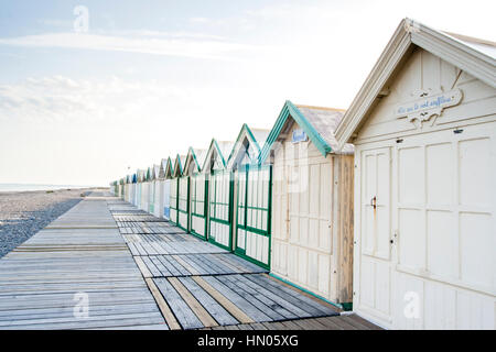 Cayeux-sur-Mer (France), shingle beach and alignement beach huts Stock Photo