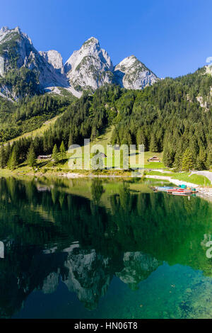 Fantastic azure alpine lake Vorderer Gosausee. Unusual and picturesque scene. Salzkammergut is a famous resort area Stock Photo