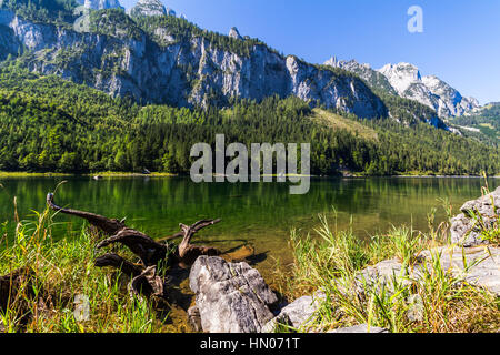 Fantastic azure alpine lake Vorderer Gosausee. Unusual and picturesque scene. Salzkammergut is a famous resort area Stock Photo