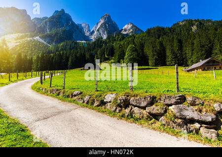 Fantastic azure alpine lake Vorderer Gosausee. Unusual and picturesque scene. Salzkammergut is a famous resort area Stock Photo