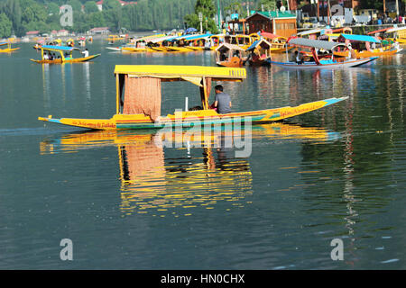 A Shikara (boat) on Dal Lake in Srinagar, Kashmir, Jammu and Kashmir State, India (Photo Copyright © by Saji Maramon) Stock Photo