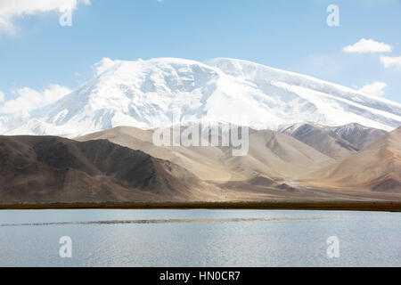 Muztagh Ata and Karakul Lake Stock Photo