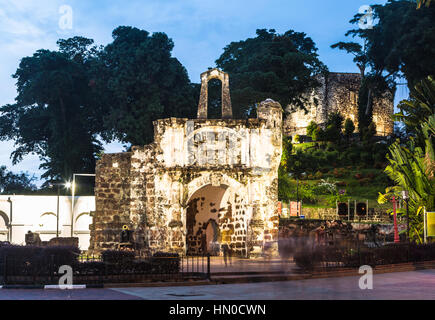 Gate of the colonial fortress and the ruined of the Saint Paul church in the background in Melaka (Malacca) colonial old town in Malaysia. Stock Photo