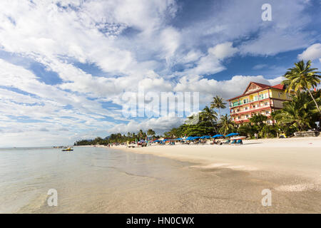 Pantai Cenang is the most popular beach on the Langkawi island along the Andaman sea in Malaysia Kedah state. Stock Photo