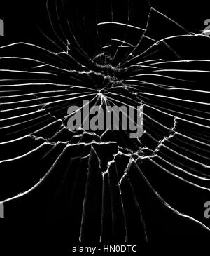 Detail of the shattered glass - cracks and shards -hit glass Stock Photo