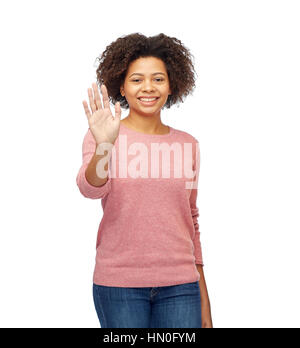 happy african woman waving hand over white Stock Photo