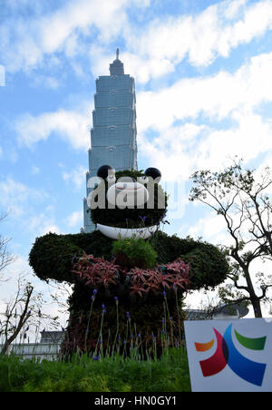 A florally arranged 2017 Universiade mascot outside Taipei 101 promoting the event being held in Taipei August 2017 Stock Photo