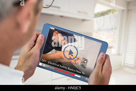 Fast forward sign on digitally generated blank screen against man using digital tablet and smart phone at table Stock Photo