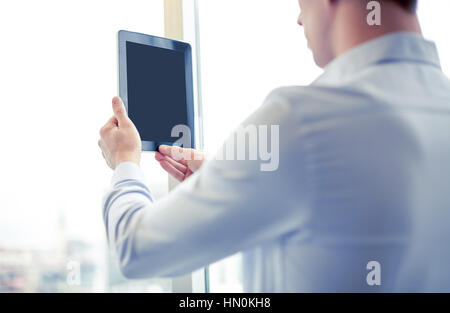 businessman with tablet pc in office Stock Photo