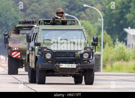 BURG / GERMANY - JUNE 25, 2016: german light armoured patrol vehicle Enok, drives on open day in barrack burg / germany at june 25, 2016 Stock Photo