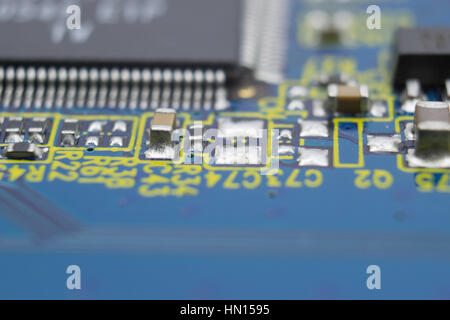 Close up of printed circuit board with big microchip and other components Stock Photo
