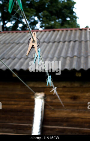 clothespins, clothespins hanging on the ropes. Stock Photo