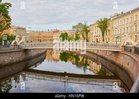 Bridge of Four Lions. 28 metre pedestrian bridge over the Griboedov Canal has 4 cast iron lion sculptures and opened in 1825, St Petersburg, Russia Stock Photo