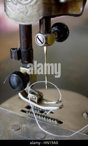 Singer sewing machine, old background Stock Photo