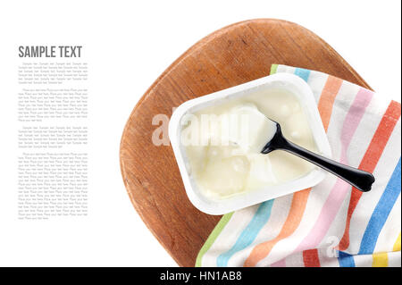 natural yogurt in white plastic container Stock Photo