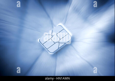 closeup nano SIM card on human hand Stock Photo