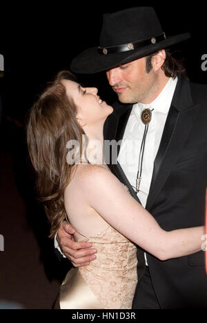 Director Robert Rodriguez kisses girlfriend Marci Madison on the Croisette at the 65th Cannes Film Festival in Cannes, France on May 19, 2012. Photo by Francis Specker Stock Photo