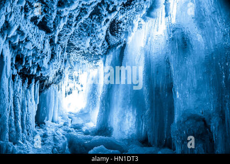 Ice cave in frozen waterfall Jagala, Estonia Stock Photo