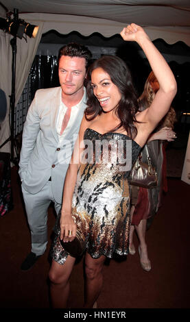 Luke Evans and Rosario Dawson leave the Roberto Cavalli party in Cannes, France on May 18, 2011. Photo by Francis Specker Stock Photo