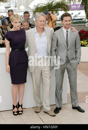 From left,Carey Mulligan,  Michael Douglas, and Shia LaBeouf at the photocall for the film 'Wall Street: Money Never Sleeps', at the 63rd Cannes Film Festival in Cannes, France on May 14, 2010. Photo by Francis Specker Stock Photo