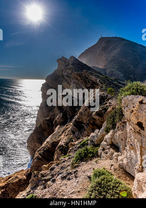 Albir Lighthouse. The walk to the lighthouse can be very rewarding to take in some of the best views of Albir and its coast line. Stock Photo