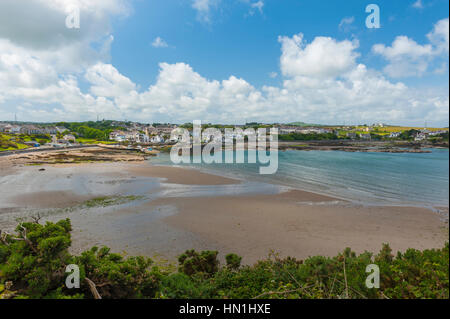 The bay at Cemaes village on the north coast of Anglesey in Wales, sited on Cemaes Bay, an Area of Outstanding Natural Beauty which is partly owned by Stock Photo