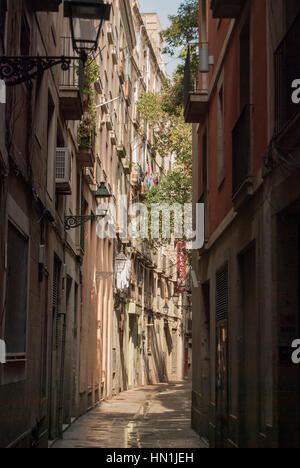 Narrow street in the Gothic quarter of Barcelona Spain. Stock Photo