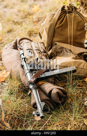 German  Wehrmacht sub-machine gun of World War II MP 40 on ground. The MP 40 (Maschinenpistole 40) is submachine gun was developed in Nazi Germany and Stock Photo