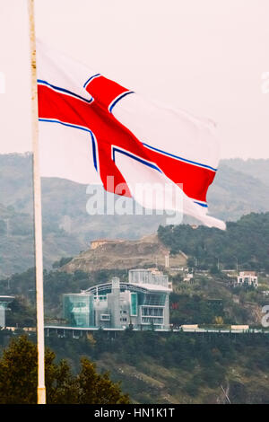 Flag Of The Georgian Orthodox Church Over The Complex Of Buildings, Residence And Trade Center In Sololaki Ridge Owned By The Georgian Tycoon Boris (B Stock Photo