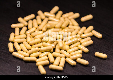 Medication and pills on a black background Stock Photo