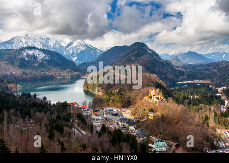 Panoramic view of scenic idyllic winter landscape in the Bavarian Alps at famous mountain lake Alpsee, Fussen, Allgau Stock Photo