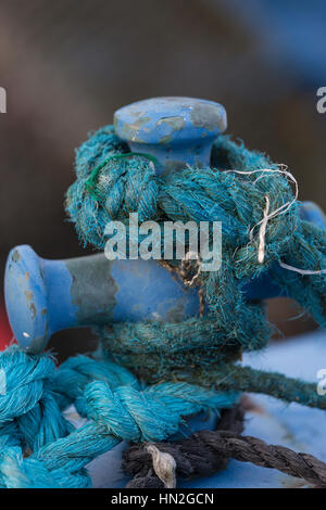 Cleat and mooring rope on fishing boat, Portmagee, Ireland Stock Photo