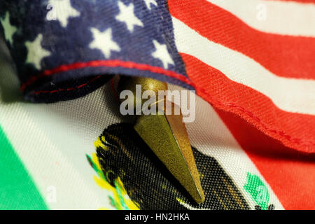 american flag and mexican flag go to battle america and mexico divided / divided we stand. Stock Photo