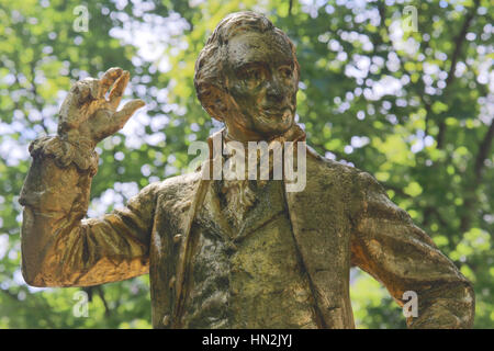 A gold-covered statue of Thomas Paine is found in the Parc Montsouris along the Boulevard Jourdan in the 14th arr.; the inscription reads: “Thomas Paine; Citoyen du Monde; 1737-1809; Englishman by birth; French citizen by decree; American by adoption, Paris France - author of 'Common Sense' Stock Photo