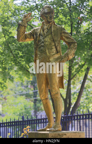 A gold-covered statue of Thomas Paine is found in the Parc Montsouris along the Boulevard Jourdan in the 14th arr.; the inscription reads: “Thomas Paine; Citoyen du Monde; 1737-1809; Englishman by birth; French citizen by decree; American by adoption, Paris France - author of 'Common Sense' Stock Photo