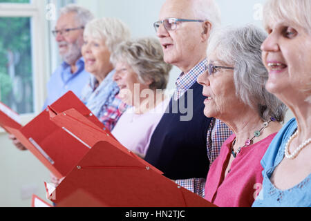 Group Of Seniors Singing In Choir Together Stock Photo